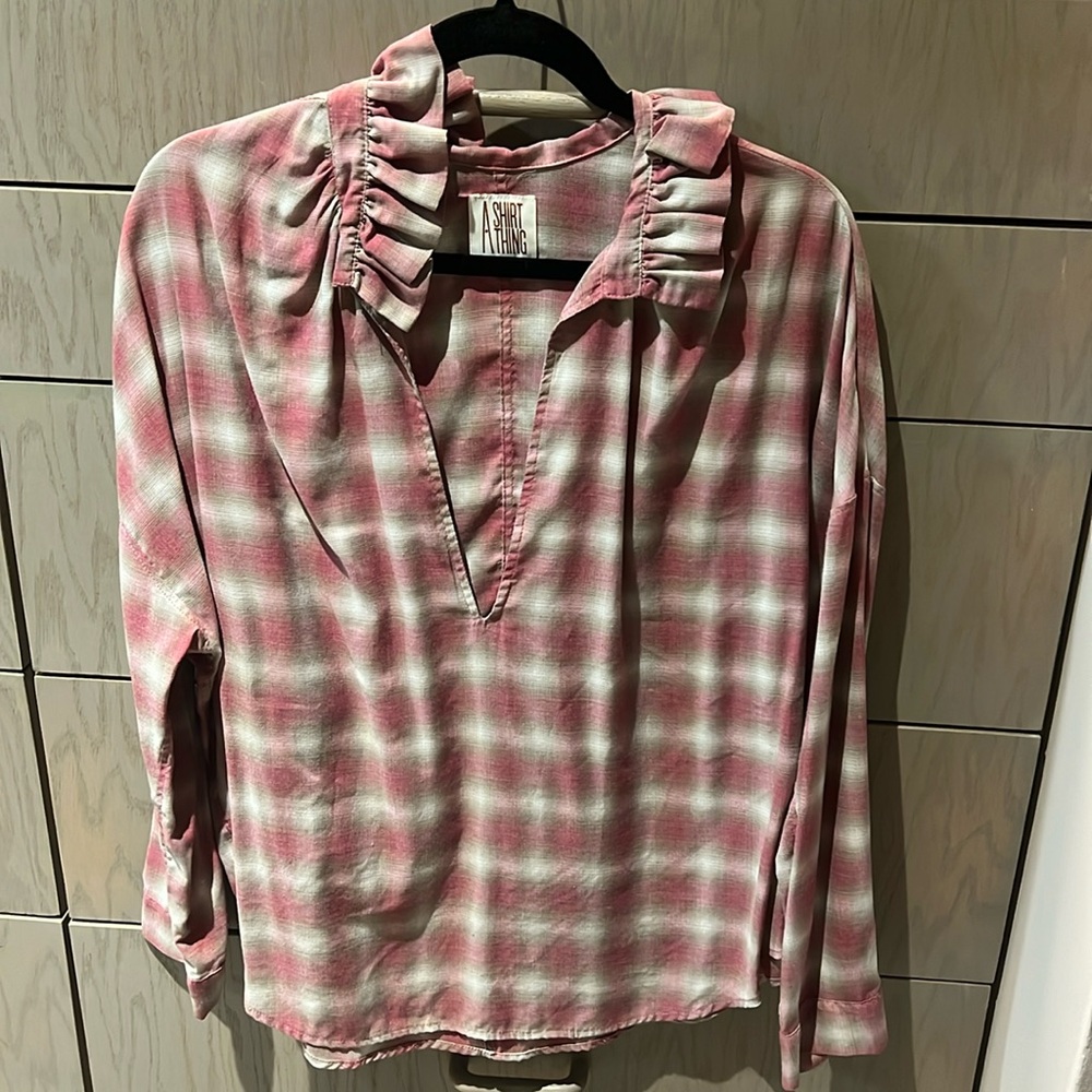 A shirt thing ruffled collar, tan, beige, and red plaid